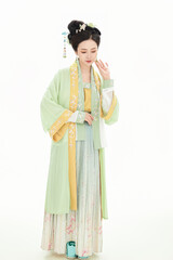 Fototapeta premium A woman wearing ancient Chinese clothing against a white background.