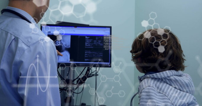 Image of medical data processing over diverse male doctor and boy patient using computer