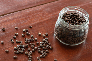 Roasted coffee beans close up background