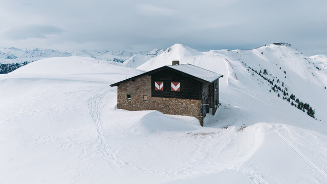 Tyrolean mountain hut in snowy Kitzb&uuml;hel, Tyrol, Austria