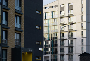 Architecture building urban apartment, city housing modern facade exterior. Residential new windows...