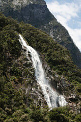 Obraz premium waterfall in the mountains, Milford Sound, New Zealand