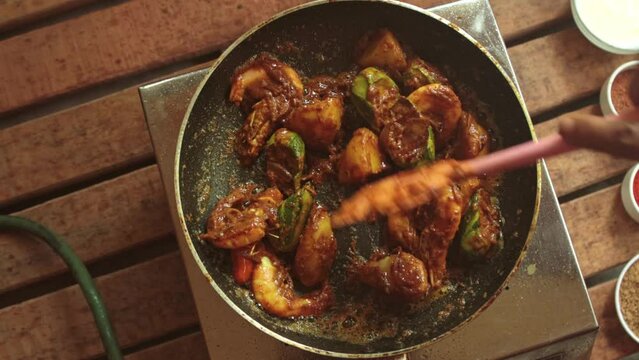 cooking pointed ground or potol or parwal shrimp curry with potato