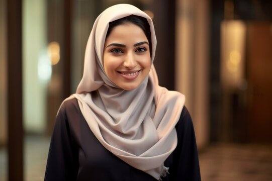 indoor portrait of cheerful saudi woman in mid 20s