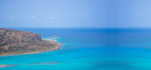 Fototapeta premium a splendid sea merges with the sky with a spectacular blue background