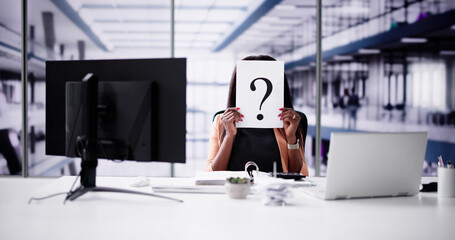 Businesswoman Holding Question Mark Sign On Paper