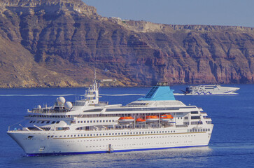 Dream holiday vacation to Greek Island Santorini during Summer Mediterranean Aegean cruising on Celestyal breathtaking nature landscape scenery