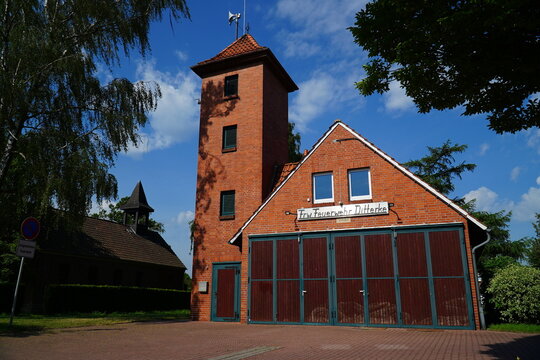 Volunteer fire department (Frw. Feuerwehr Ditterke) of the village of Ditterke. Firefighter tower and fire station building in Gehrden Ditterke, district Hanover, Lower Saxony, Germany