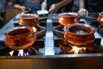 Meat in pot, close up. Tasty street food in Pakistan. 