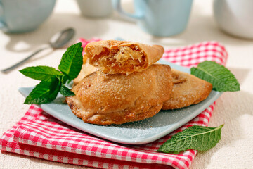Sweet pastries stuffed with pumpkin and syrup.