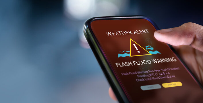 Resilience and Adaptability for Climate Change, Environment Issue, Flash Flood Warning System Alert on Mobile Phone