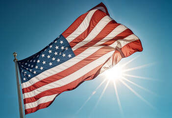 an american flag is flying in the sun with the sun shining in the blue sky background