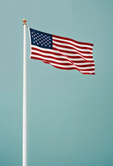 Fototapeta premium an american flag with pole flying in the wind on turqoise background