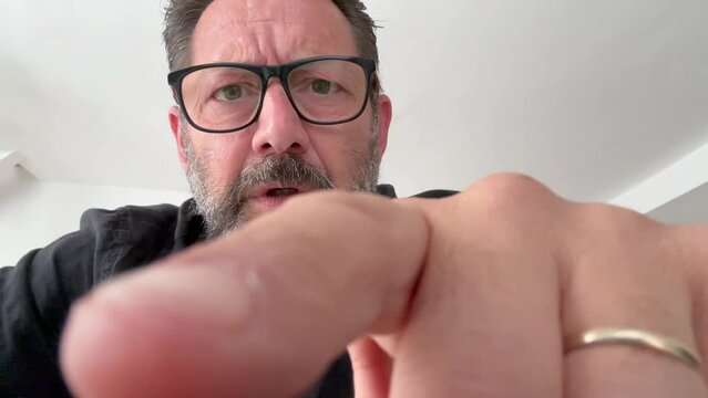 Fraud and scam website link concept virus with man in camera view thinking about click or not then do desperate expression and gesture for bad decision. Password security stolen data hacking web