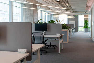 Interior of modern empty office building.Open ceiling design.Equipped with automatic lifting table...