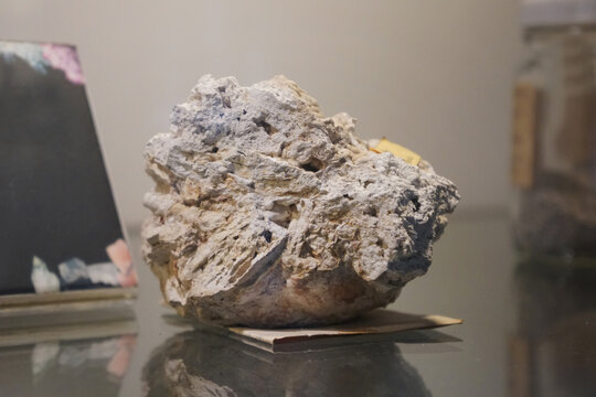 Raw specimen of phosphate mineral rock stone show in the Geological Museum. Mineral and Stone Museum.