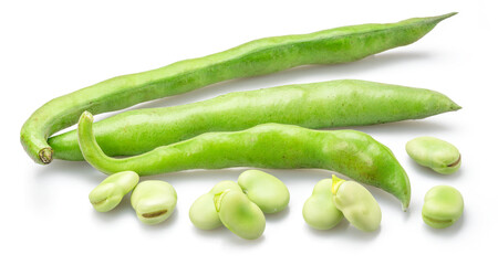Green young broad bean pods and several broad beans near its isolated on white background.