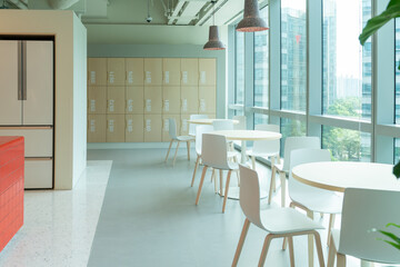 Interior of modern empty office building.Open ceiling design.Equipped with automatic lifting table and LCD screen.