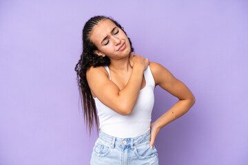 Young woman isolated on purple background suffering from pain in shoulder for having made an effort