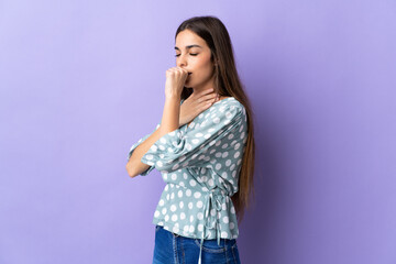 Young caucasian woman isolated on blue background coughing a lot