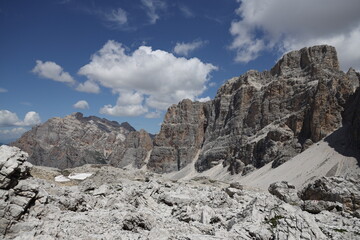 Beautiful view of rocky mountains against the backdrop of a blue sky. Fanis group, Dolomites, Italy