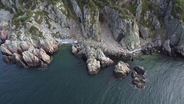 Ascending drone shot of Kullaberg peninsula in Hoganas Municipality in southwest Sweden