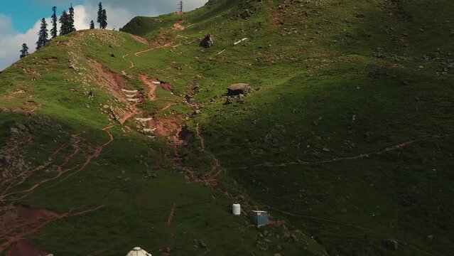 Drone shot of camp tents on Ganga Choti peak in Bagh District of Azad Kashmir, Pakistan