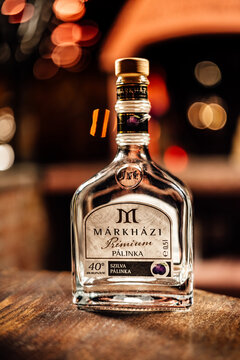 Vertical closeup of Premium Hungarian palinka in a gorgeous bottle