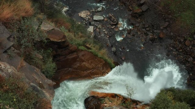 Drone footage of the scenic Chamb Waterfall (Cham Waterfall) in daytime in Azad Kashmir, Pakistan