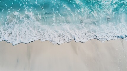 Naklejka premium Close-Up of White Sand and Crystal Blue Sea 