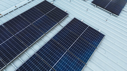 Green energy solar panels on an industrial building roof Sunlight powers the future