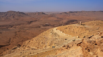 Makhtesh Ramon is a geological feature of the Israeli Negev Desert. Situated approximately 85 km south of the city of Beersheba, this landform represents the world's largest erosion circus. The format