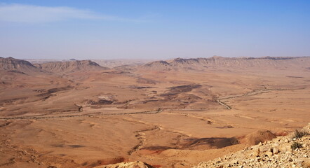 Fototapeta premium Makhtesh Ramon is a geological feature of the Israeli Negev Desert. Situated approximately 85 km south of the city of Beersheba, this landform represents the world's largest erosion circus. The format