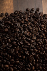 Top view of coffee beans on a wooden tabletop