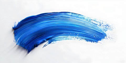 Abstract blue paint brush stroke isolated over the white background as a design element.
