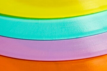 Vibrant close-up of assorted colorful plastic plates