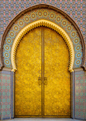 Fes, Morocco Golden door of the Royal Palace in Fez, the imperial city of Morocco. It is considered...