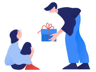 Man giving gift to woman
