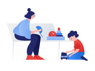 Woman looking after the playing boy