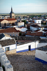 View of Iglesia de Nuestra Senora de la Asuncion with other historical buildings. Campo de Criptana