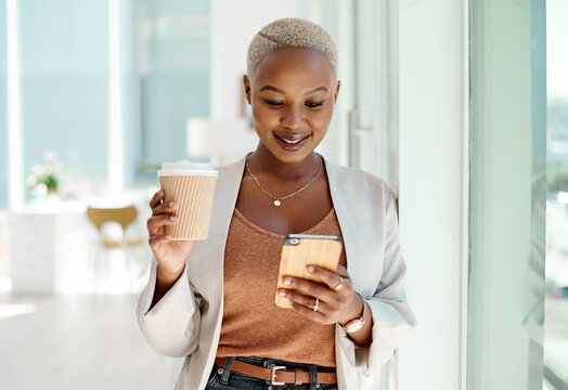 Black woman, business and smartphone in office with smile, coffee cup and texting, networking or social media. African, female person and employee at company as project manager in corporate on tech