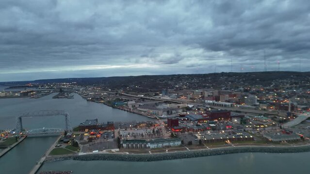 Aerial footage of Canal Park and Aerial Lift Bridge in Duluth city at sunset in Minnesota, USA