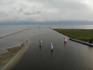 Yachts go out from the bay!