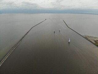 Yachts go out from the bay!