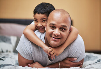 Father, son and portrait with love in bedroom for bonding with people, home and family for...