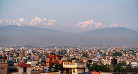 Obraz premium Beautiful shot of a Nepalese village nestled near the Himalayas