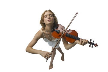 young blonde female musician plays the violin with her eyes closed top view, isolated on...