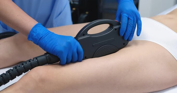 Adult woman with laser hair removal in professional beauty salon. Hair removal in bikini area concept