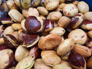 Fresh dogfruit or jengkol is displayed and sold in indonesian traditional markets.