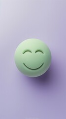 Fototapeta premium relieved emoji on a lavender background with space for copy The emoji is light green with a calm smile